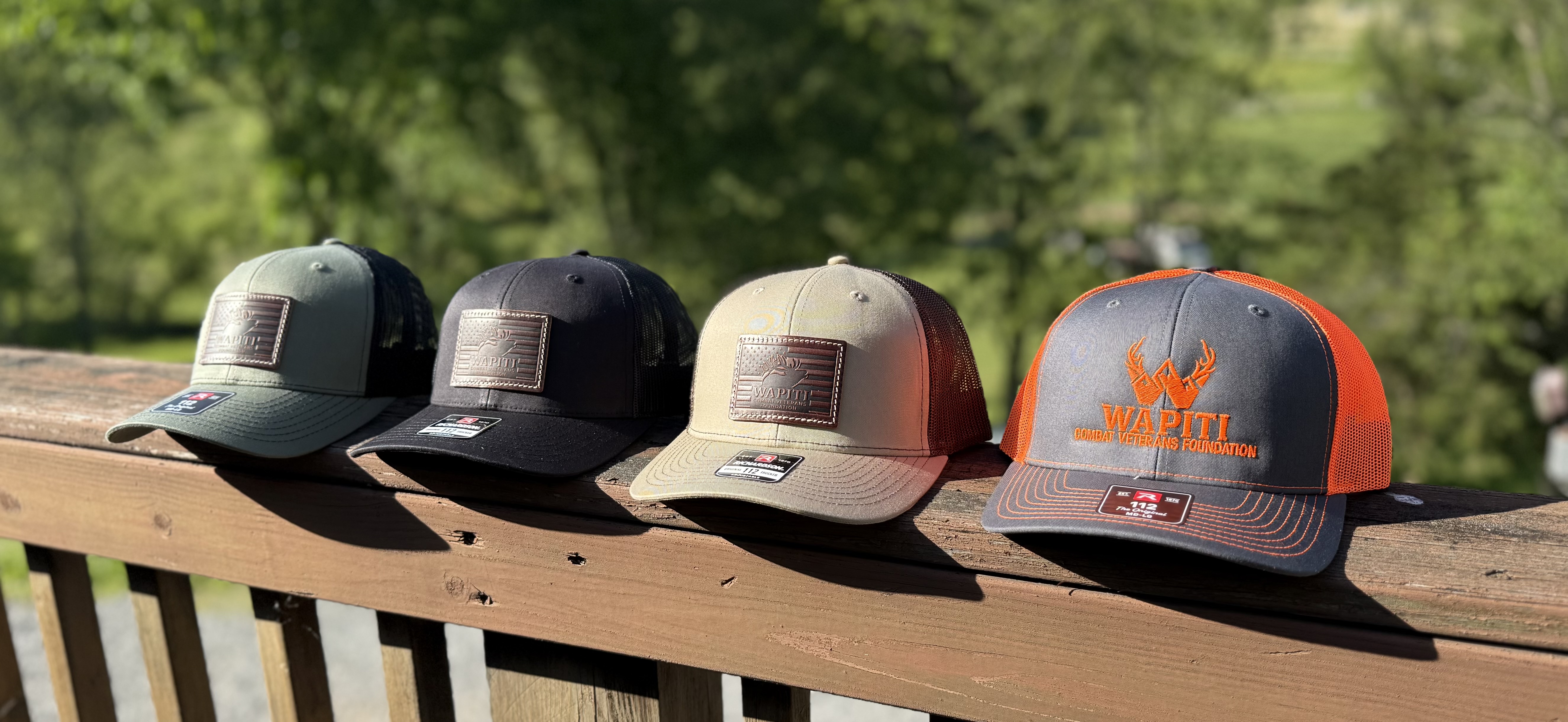 Wapiti hats displayed on a railing